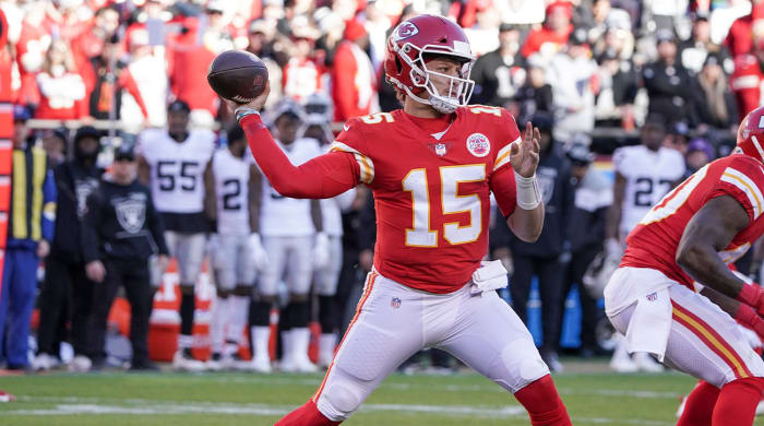 Dec 12, 2021; Kansas City, Missouri, USA; Kansas City Chiefs quarterback Patrick Mahomes (15) throws a pass against the Las Vegas Raiders during the second half at GEHA Field at Arrowhead Stadium.